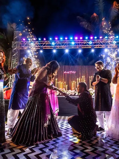 A sangeet night is more than just dancing; it's about creating core memories. Here, I designed a surprise proposal moment on the dance floor, complete with dramatic cold pyro effects to make the "yes" even more spectacular.