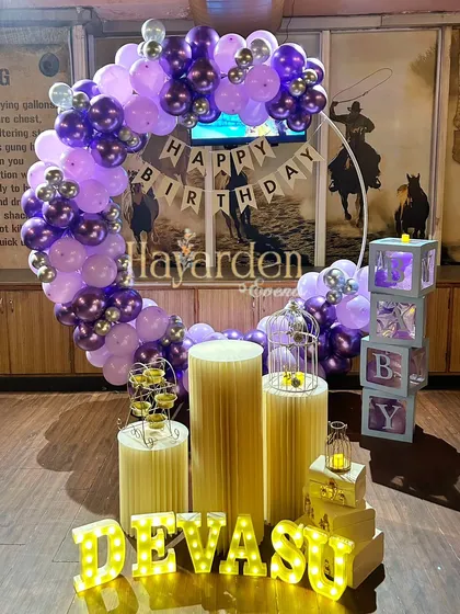 Another purple and silver balloon ring, this time in a restaurant setting, showing its versatility.