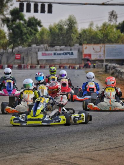 A group of Senior Max karts lined up on the track, demonstrating the depth of the field in our top category.