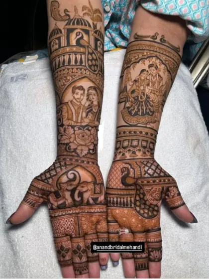 This custom design features a couple's portrait, Radha-Krishna, and traditional elephant and peacock motifs.