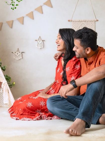 A duplicate of a playful peek-a-boo moment. These candid shots are often the favorites from a family session.