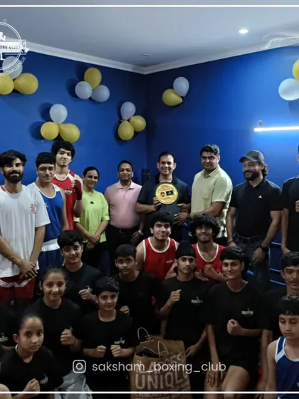 This is our team. A community of dedicated boxers and coaches celebrating our collective hard work and success. We train together and we win together.