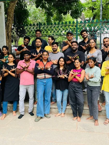 A group of volunteers striking a pose after a classical dance workshop in Cubbon Park. We explore all forms of dance to make our inclusive festival, Tandav, a rich and diverse experience for everyone.