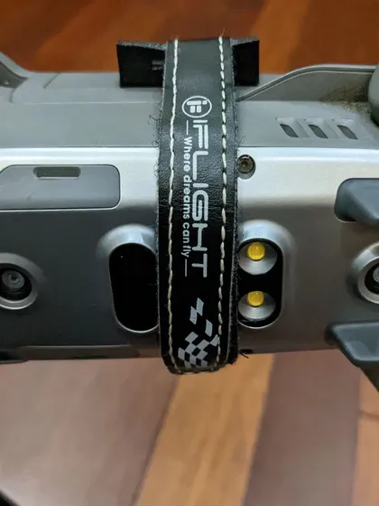 A detailed look at the iFlight strap securing the FPV transmitter to the drone. Reliable gear is essential for ensuring smooth and safe flights during a property shoot.