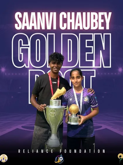 Sanvi Chaubey with her coach, holding both the Golden Ball and Golden Boot trophies from the Reliance tournament. A true superstar.