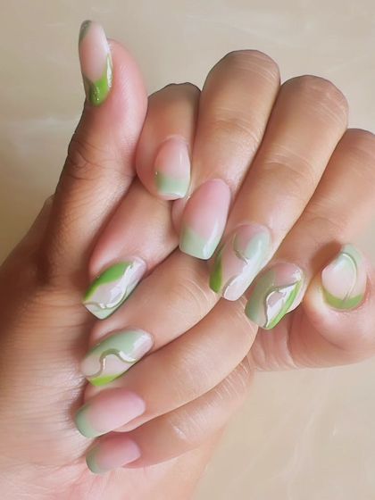 An abstract design with shades of green, featuring swirls and color-blocking on a sheer base for a modern, artistic look.