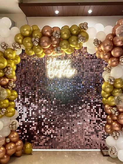 This is the complete rose gold sequin wall setup, ready for a celebration. It provides a fantastic background for photos and instantly elevates the party's ambiance. I handle the entire installation and removal, making it a hassle-free option for your event.