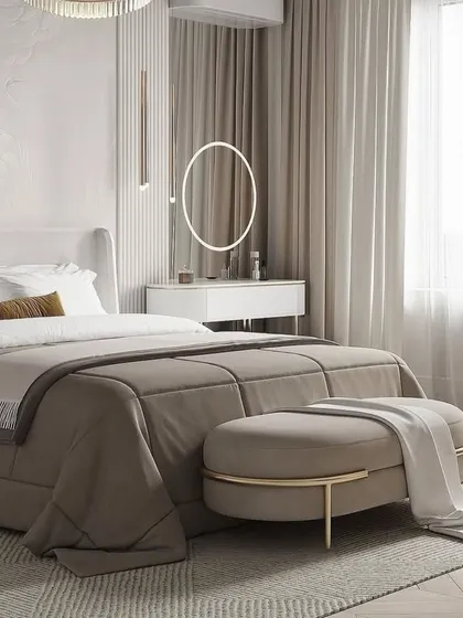 This view highlights the vanity area with its modern backlit mirror, set against a backdrop of sheer curtains that flood the room with natural light.