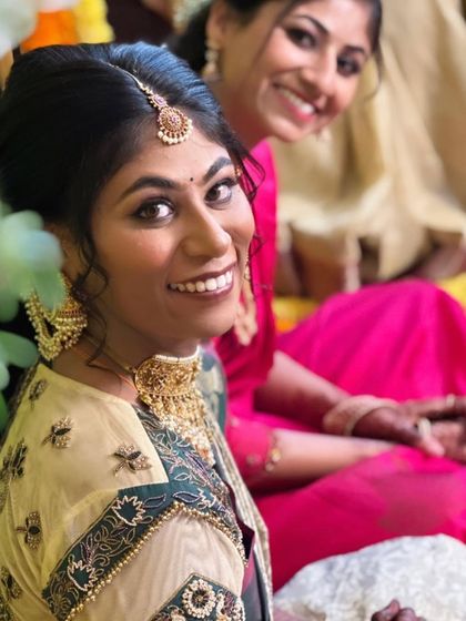 A happy, candid shot of Shailaja during her Devarakarya. Her smile is infectious.