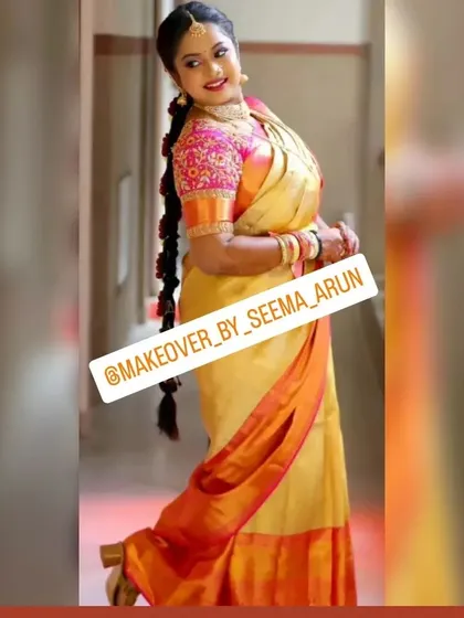 A full view of a traditional muhurtham bride. I ensure the Kanchipuram saree is draped perfectly and the hairstyle, a classic South Indian braid, is neat and secure, allowing the bride to move comfortably throughout the ceremony.