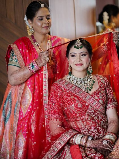 A precious moment between the bride and her mother. The makeup is designed to be beautiful in photos and emotionally resonant in person.