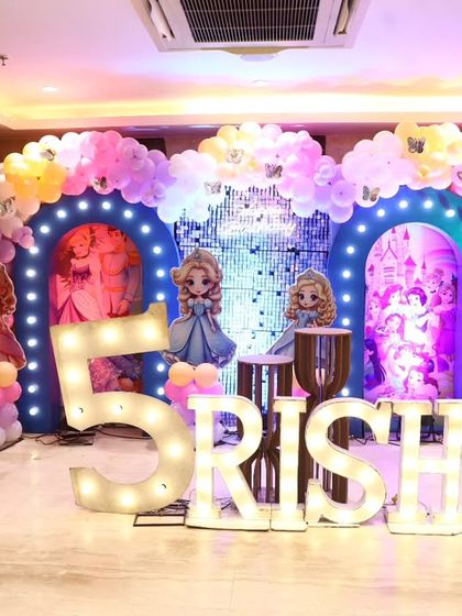 A full view of the princess party setup, including the stage, character props, and sound system for music and entertainment.