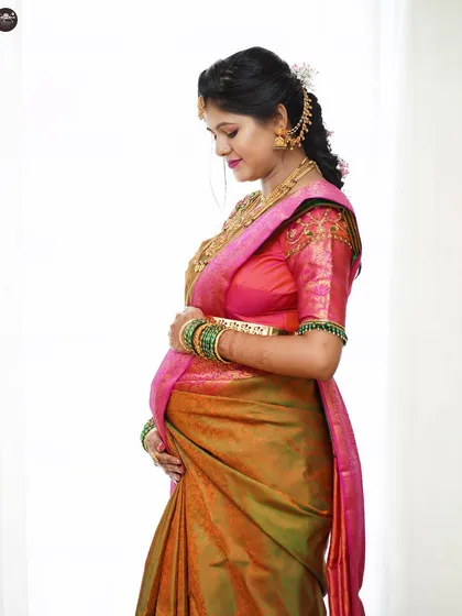 A serene, side-profile portrait of the mother-to-be. Studio lighting allows me to create soft, elegant images that highlight the baby bump.
