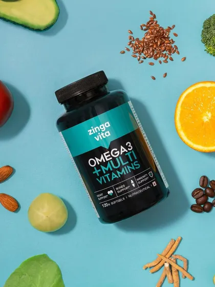 A flat lay for Zingavita's Omega3 + Multivitamins, surrounded by the healthy foods its nutrients are derived from. This "deconstructed" approach visually explains the product's benefits and natural sources.