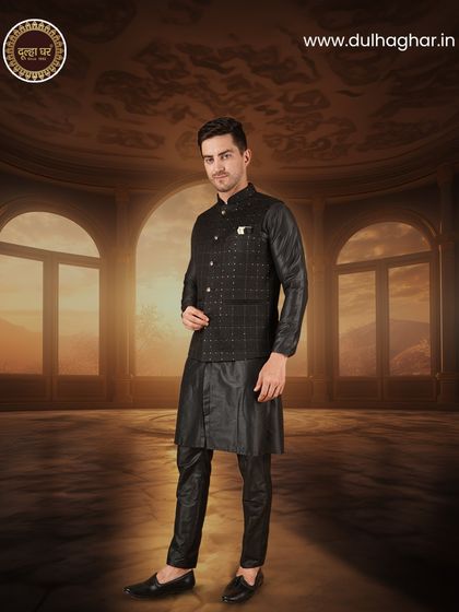 Elevate your ethnic style with this stunning black ensemble, perfect for any special occasion. This look is set against a grand, palatial backdrop.