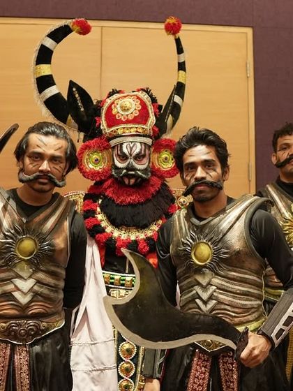 Our fierce warriors and Yakshagana character posing backstage. The detailed costumes and makeup are a crucial part of our theatrical productions.