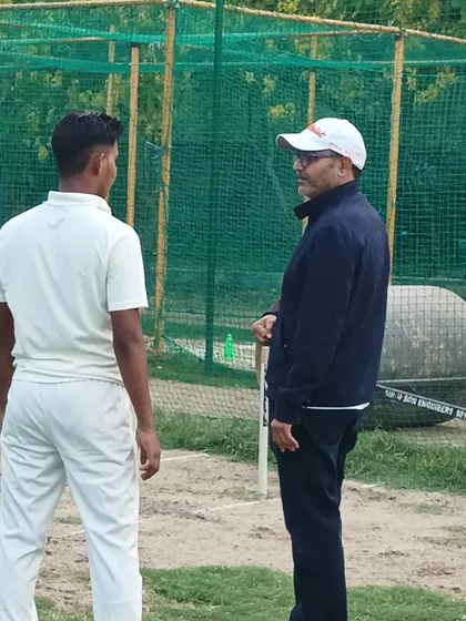 One-on-one interactions are a key part of our mentorship. Here, a trainee receives personalized feedback from Virender Sehwag, a unique opportunity for aspiring players.