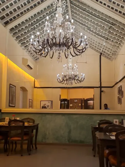 The beautiful interior of Saravá, with its high ceilings and vintage chandeliers.