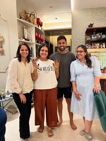 It’s always a pleasure to work with such warm and wonderful people. Here I am with cricketer Surya Kumar Yadav and his lovely wife Devisha. Creating mehndi for their family's special occasions is always a cherished experience.