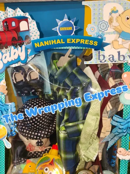 Another view of the Shivank's 'Nanihal Express' hamper, decorated with train and baby-themed cutouts.