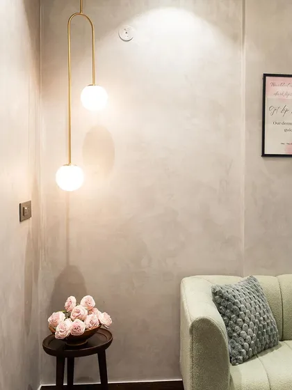 Another view of the globe pendant in the office waiting area, showing how it creates a welcoming and stylish first impression.