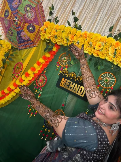 A joyful, dancing pose from the bride Sonu. I love it when my brides have fun while showing off their henna.