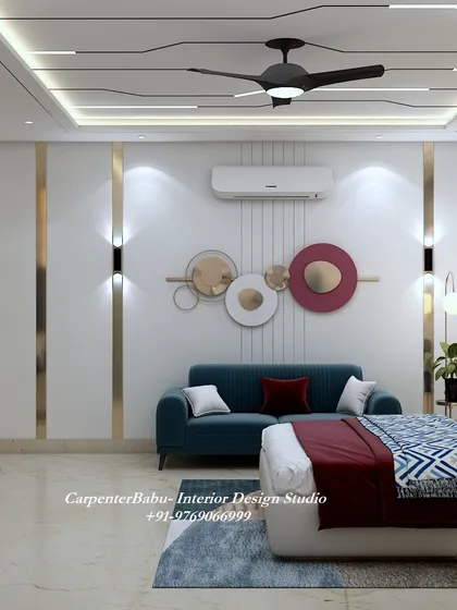 This bedroom features a comfortable sofa and modern wall art, creating a relaxing seating area within the master suite.