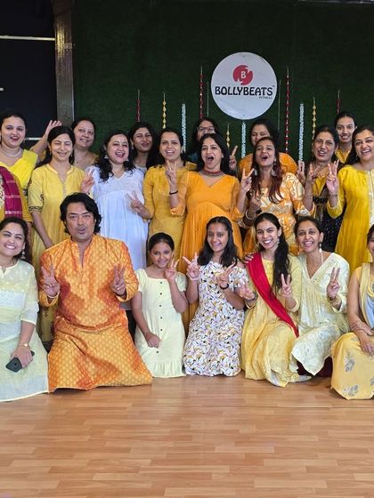 I had to jump in for a group photo with this amazing crew in Bangalore! Their energy and passion are what fuel me. This is the BollyBeats family, full of support and good vibes.