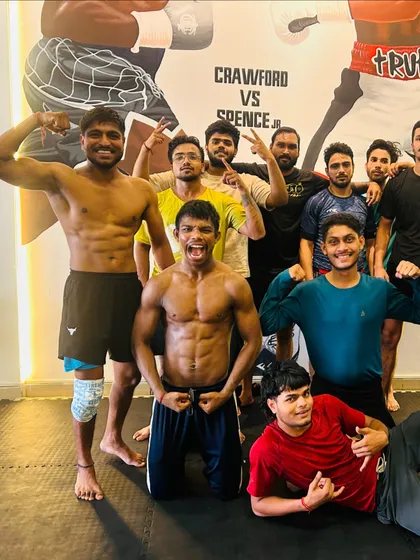 The energy of the team after a tough session. We train hard together and we celebrate our strength together. Look at the confidence and power in this crew.