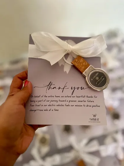 A simple "thank you" can be powerful. We designed these elegant cards with a custom keychain for an electric vehicle brand to express gratitude to their clients.