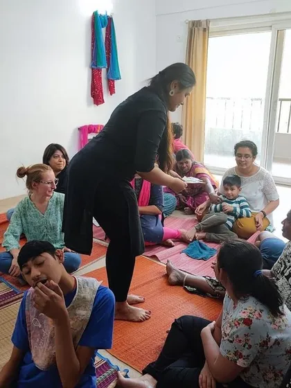 A snapshot from our arts-based therapy session, where we use puppets to encourage expression and interaction in a safe and playful environment.