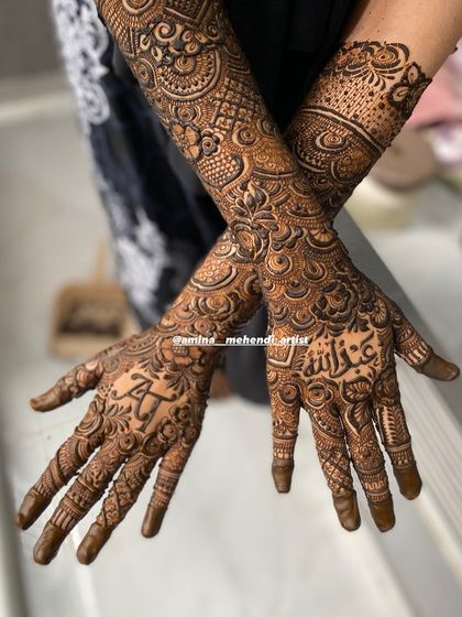 A beautiful crossed-hands pose showing the personalized design for 'Abdullah'.