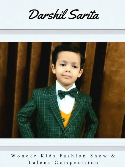 Welcome aboard, Darshil Sarita. His plaid suit and bow tie are the definition of dapper.