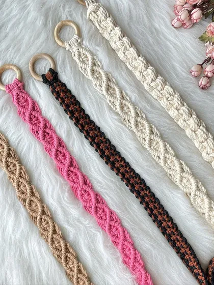My handmade macrame belts, perfect for adding a bohemian touch to any outfit. Pictured here are five different color options, from neutral off-white and earthy brown to bold pink, each featuring a beautiful knotted pattern and a smooth wooden ring buckle. I can customize the size and color for a perfect fit.