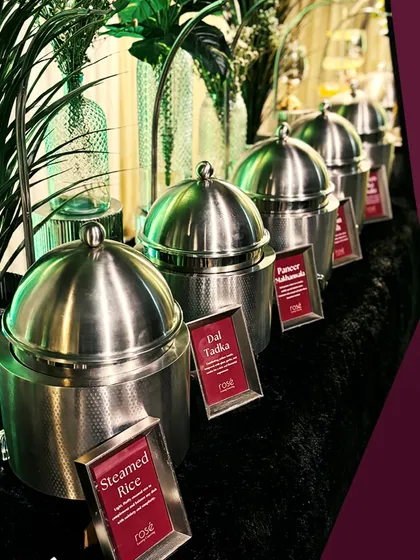 A closer look at our Indian buffet, with dishes like Steamed Rice, Dal Tadka, and Paneer Pasanda clearly labeled. We turn every event into an extraordinary experience with gourmet perfection.