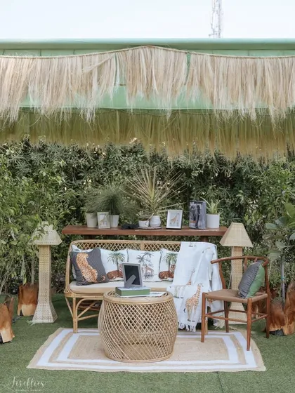 This cozy lounge was part of a 'Safari Sundowner' for Neomi and Rakshit, inspired by their love for nature. We used earthy textures, custom animal-print cushions, and natural materials to create a laid-back, luxe jungle escape for their guests.