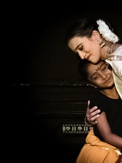 The connection between a guru and shishya is precious. In this moment from a performance, I share a story with one of my youngest students, passing on the art of abhinaya (expression) through a gentle embrace.
