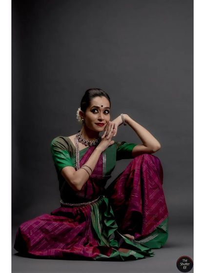 A relaxed portrait taken during a studio shoot. Even in stillness, the posture and gaze of a dancer can convey a story and a sense of grace.