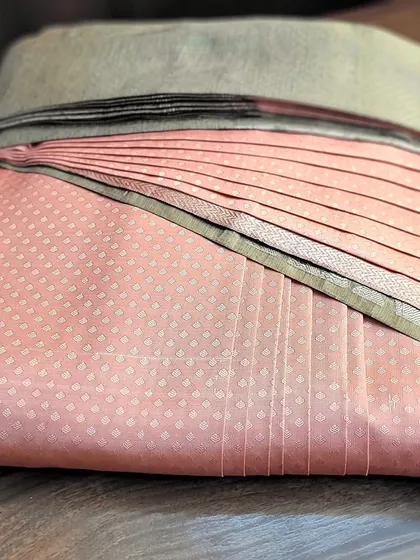 The final folded saree, ready for the client. This service is perfect for maintaining expensive silk sarees.