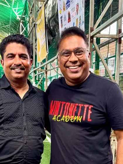 Our founder with an official at a turf facility, discussing potential collaborations. We are always looking for new spaces and partners to expand our volleyball programs.