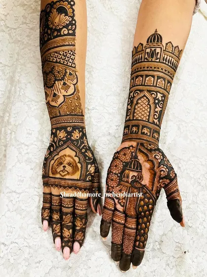 Your mehendi should be all about you, and that includes your furry friends. I loved creating this special bridal design featuring an adorable portrait of the bride's beloved puppy, nestled among traditional palace and floral patterns.