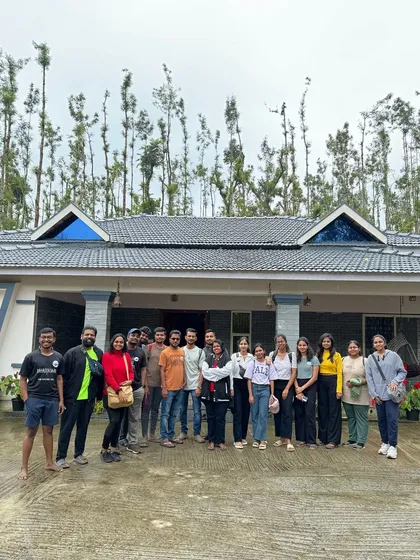 A group of travelers at their homestay in Chikmagalur. I select comfortable and scenic accommodations that are perfect for groups to relax and bond after a day of exploration.