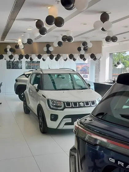 Another angle of the NEXA showroom in Nerul, showing how our decorations complement the new car models on display. Our goal is to create an exciting environment for customers celebrating a new purchase.