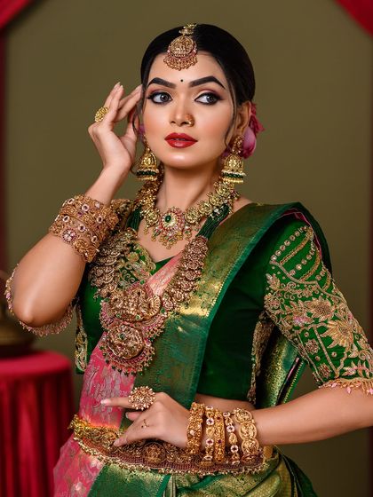 A portrait of the South Indian bride, showing the harmony between the makeup, jewelry, and attire.