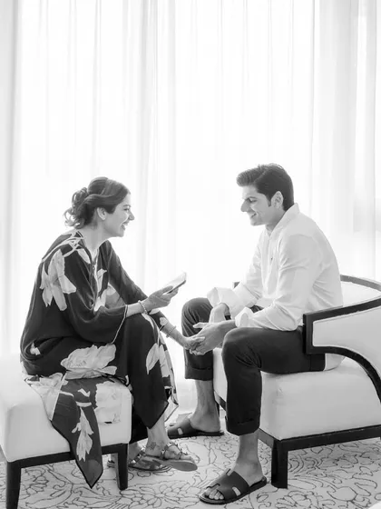 Before their nikaah, Reya reaches out to hold Sanad's hand while reading her letter to him. It's a beautiful, spontaneous gesture of connection and reassurance in a quiet, private moment.