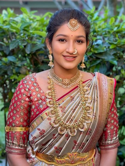 A smiling portrait that captures the client's natural beauty, enhanced with soft, subtle makeup.