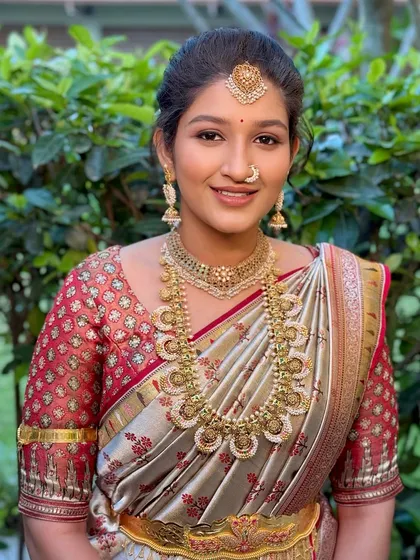 A smiling portrait that captures the client's natural beauty, enhanced with soft, subtle makeup.