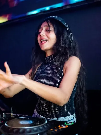 Hyping up the crowd during a set. I don't just stand behind the console; I engage with the audience, sing along, and make sure everyone feels the party vibe.