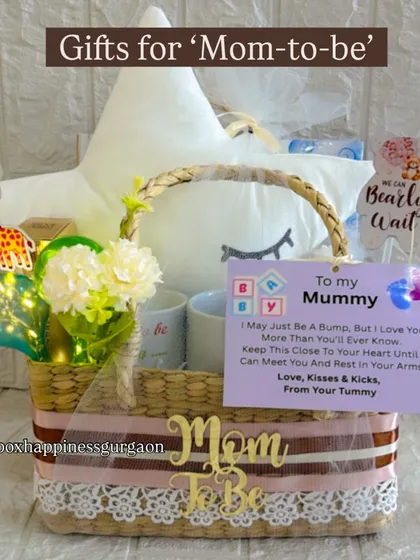 The "Gifts for Mom-to-be" basket is filled with love, from the personal note to the carefully selected items inside.