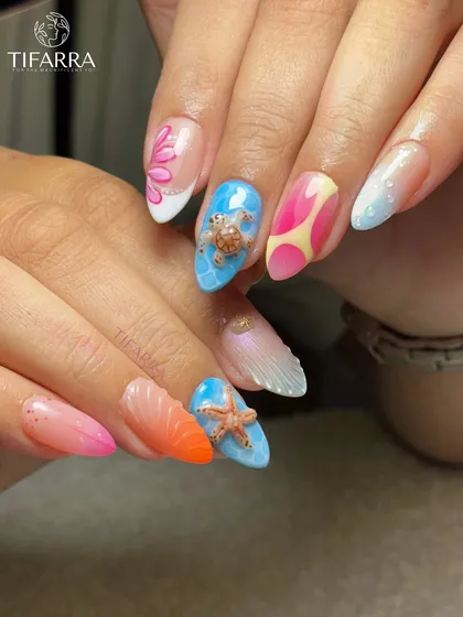 We brought the entire beach to this set of custom extensions. It features hand-sculpted 3D elements like a sea turtle and starfish, seashell textures, vibrant ombre, and realistic water droplet effects.